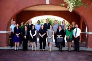 Norman Next Board of Directors standing in the archway of a building posing for a group photo